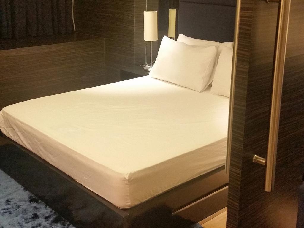 Shang Luxury Suites Mandaluyong Rom bilde
